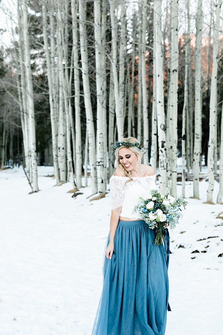 Bride White Lace Off The Shoulder Top Blue Long Skirt Floral Crown Bouquet White Blue Green Flowers Snowy Winter Wonderland Anniversary Shoot http://ryannlindseyphotography.com/