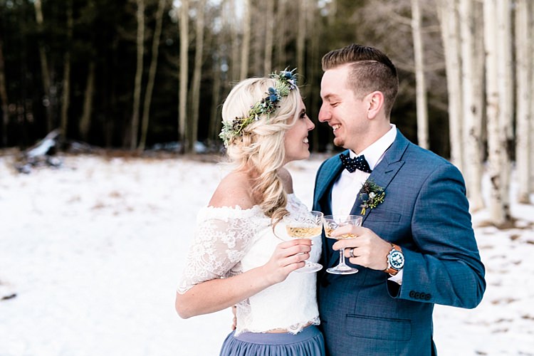 Bride Lace Off The Shoulder Top Blue Long Skirt Floral Crown Bouquet White Blue Green Flowers Groom Blue Suit Navy Polka Dot Bowtie Cocktails Snowy Winter Wonderland Anniversary Shoot http://ryannlindseyphotography.com/