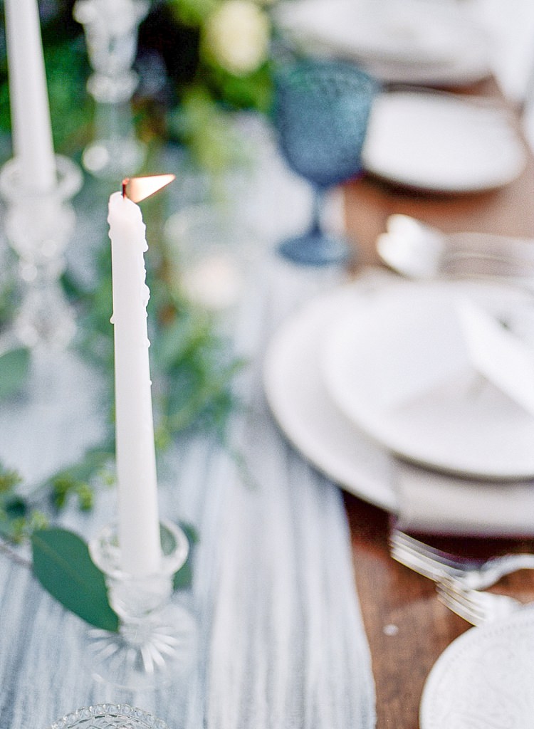 Outdoor Reception Wooden Table Blue Grey Fabric Glass Candlestick Blue Wine Goblets Patterned Plates Fresh Florals Snowy Winter Wonderland Anniversary Shoot http://ryannlindseyphotography.com/