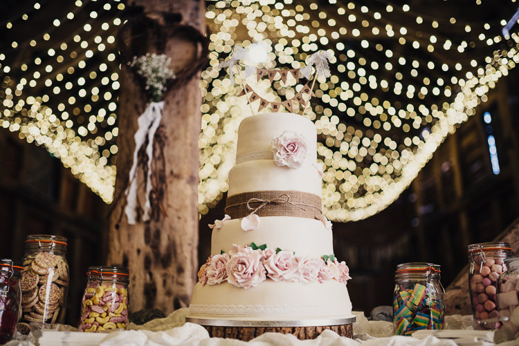 Cake Hessian Flowers Bunting Twine Log Stand Quirky Crafty Rustic Barn Wedding http://www.stevebridgwoodphotography.co.uk/