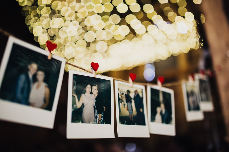 Polariod Photos String Bunting Quirky Crafty Rustic Barn Wedding http://www.stevebridgwoodphotography.co.uk/