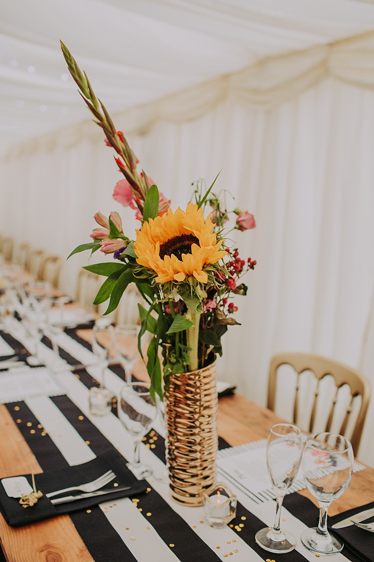 Tall Gold Vase Centrepiece Flowers Sunflower Colourful Indie Dinosaur Wedding http://bloomweddings.co.uk/