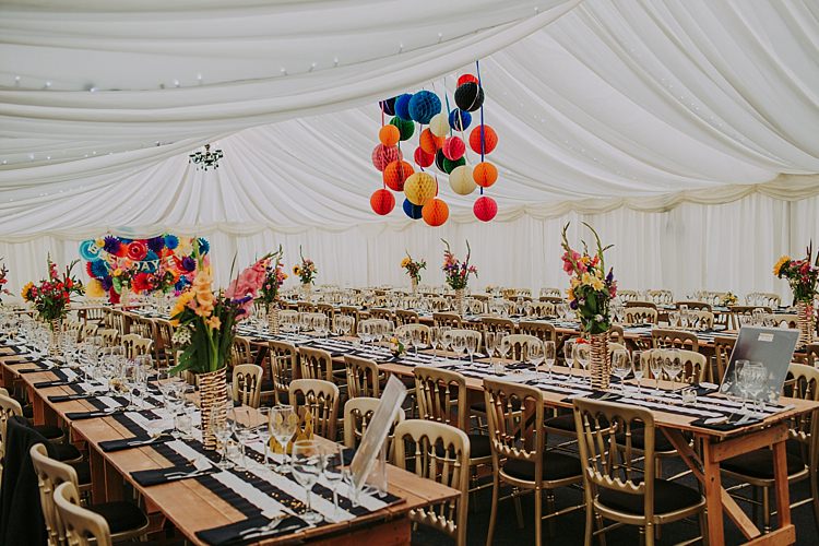 Rainbow Marquee Decor Colourful Indie Dinosaur Wedding http://bloomweddings.co.uk/