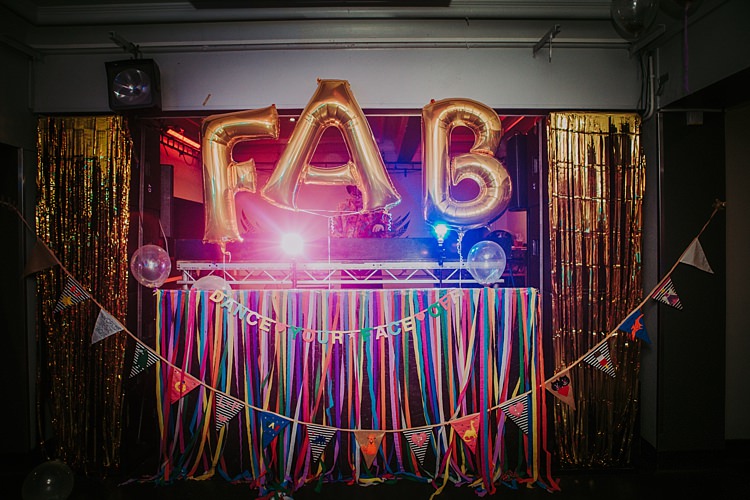 DJ Booth Ribbons Streamers Colourful Indie Dinosaur Wedding http://bloomweddings.co.uk/
