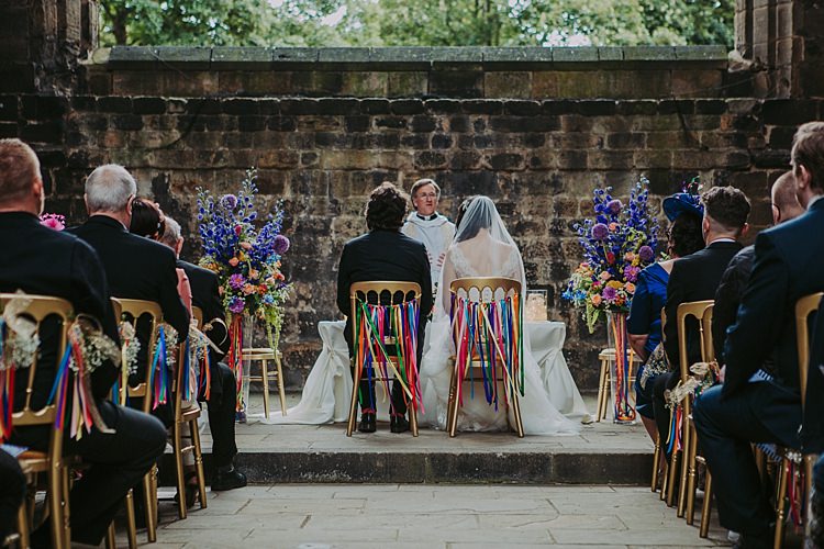Ribbon Chairs Aisle Flowers Pew Ends Colourful Indie Dinosaur Wedding http://bloomweddings.co.uk/