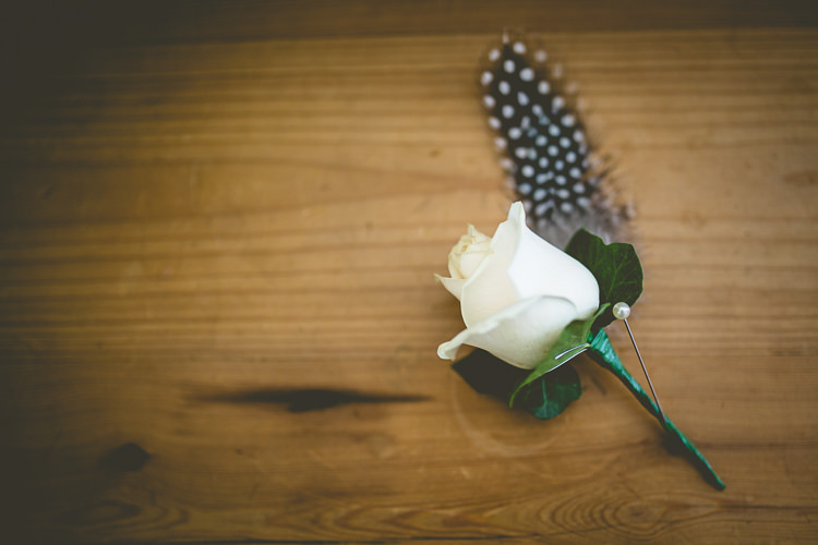 Rose Feather Buttonhole Rustic Bohemian DIY Barn Wedding http://lovethatsmilephotography.com/