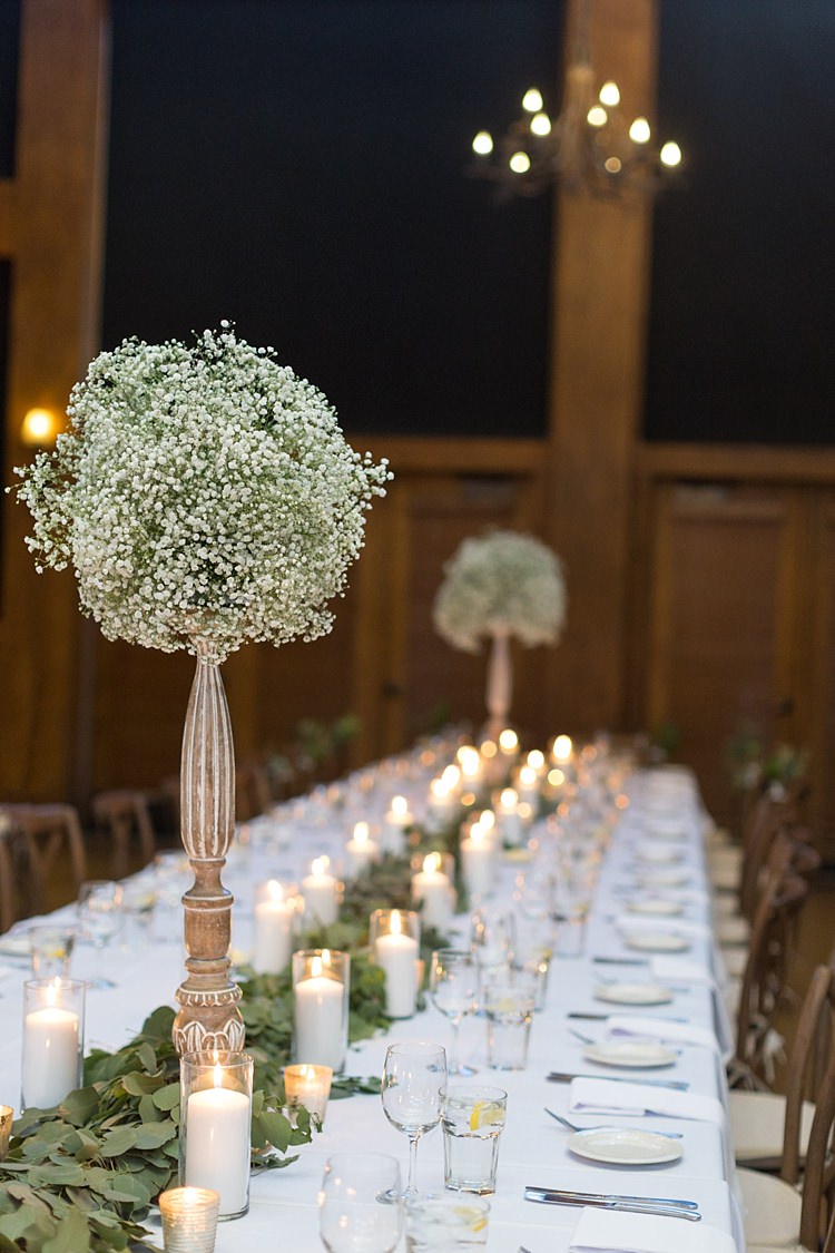 Reception Table Setting Tall Vases Gypsophila Green Leaves Candles Romantic Mountain Wedding Colorado http://irvingphotographydenver.com/