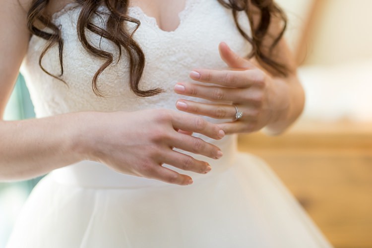 Bride Strapless Lace Ballgown Bridal Gown Loose Curls Hairstyle Oval Diamond Engagement Ring Romantic Mountain Wedding Colorado http://irvingphotographydenver.com/
