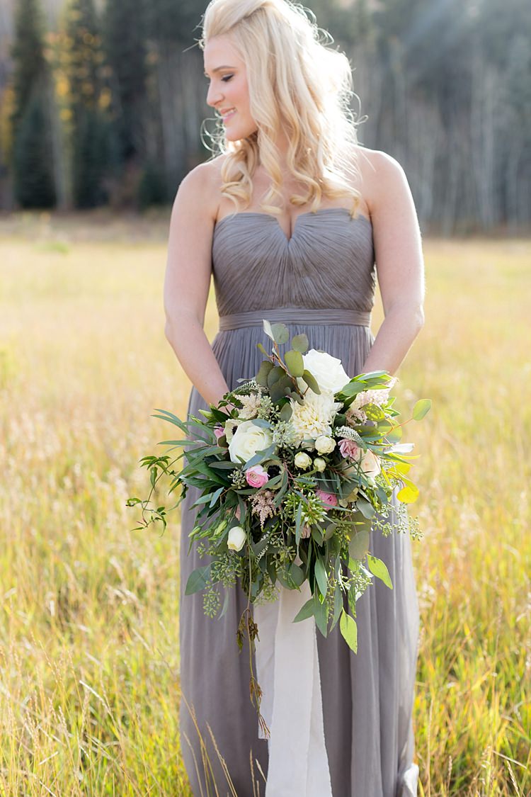 Bridesmaid Strapless Grey Dress Bouquet Multicoloured Pastel Roses Peonies Anemones Greenery White Ribbon Romantic Mountain Wedding Colorado http://irvingphotographydenver.com/