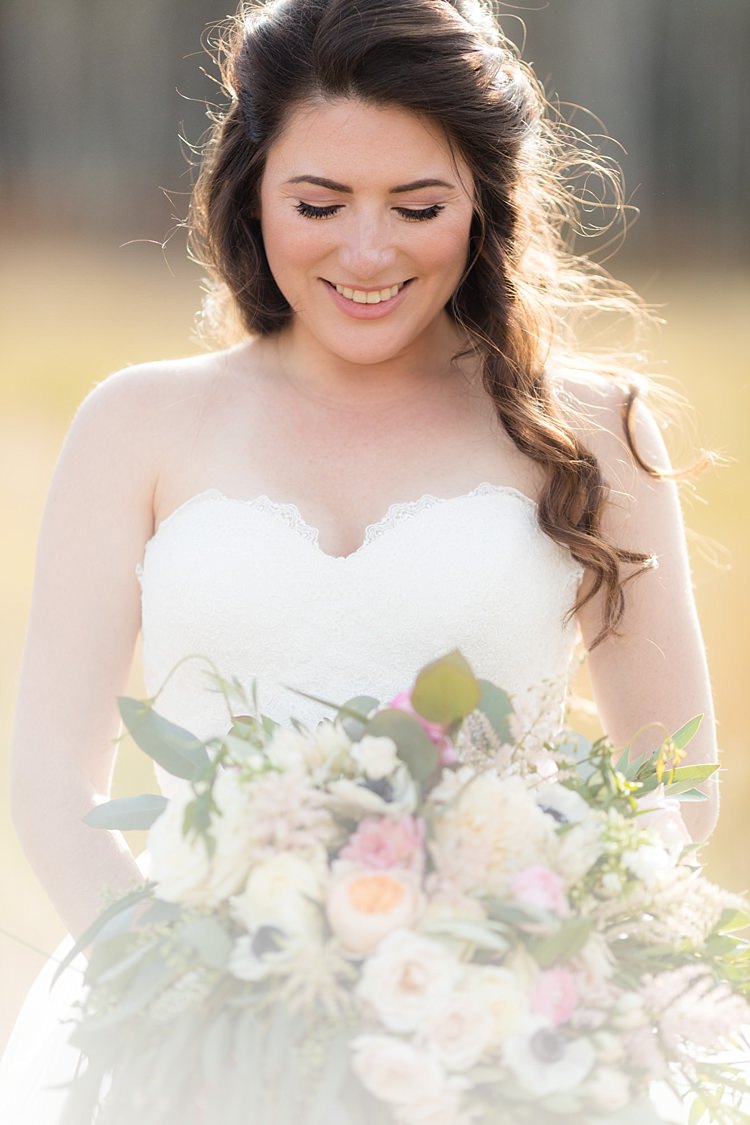 Bride Strapless Lace Ballgown Bridal Gown Bouquet Multicoloured Pastel Roses Peonies Anemones Greenery Loose Curls Hairstyle Soft Makeup Romantic Mountain Wedding Colorado http://irvingphotographydenver.com/