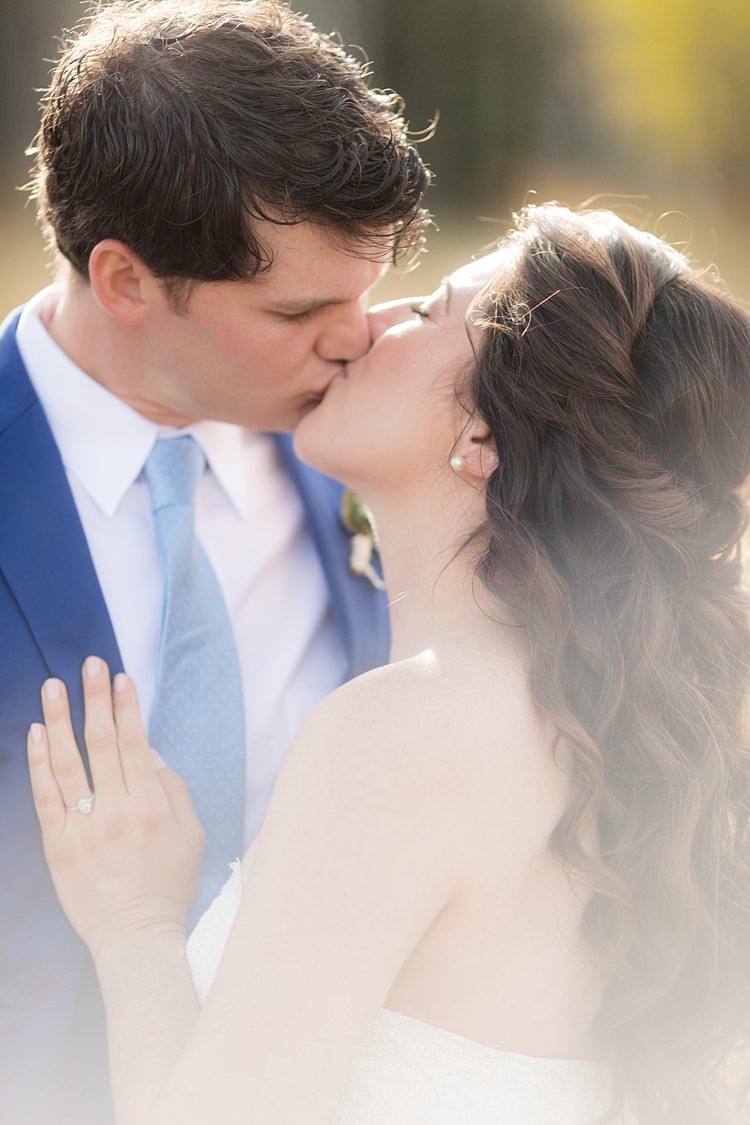 Bride Strapless Lace Ballgown Bridal Gown Loose Curls Hairstyle Groom Blue Suit White Shirt Light Blue Tie Romantic Mountain Wedding Colorado http://irvingphotographydenver.com/