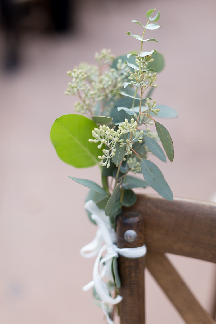 Outdoor Ceremony Wooden Chairs Green Leaves Ribbon Decoration Romantic Mountain Wedding Colorado http://irvingphotographydenver.com/