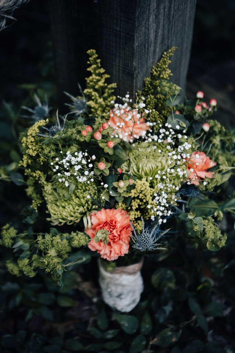 Bouquet Fresh Florals Orange Carnation Thistle Gypsophila Lace Ribbon Adventure Inspired Woodland Wedding North Carolina http://www.amandasuttonphotography.com/