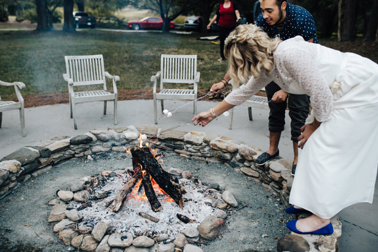 Reception Outdoor S'mores Station Bride Handmade Lace Bridal Gown Blue Shoes Guests Adventure Inspired Woodland Wedding North Carolina http://www.amandasuttonphotography.com/