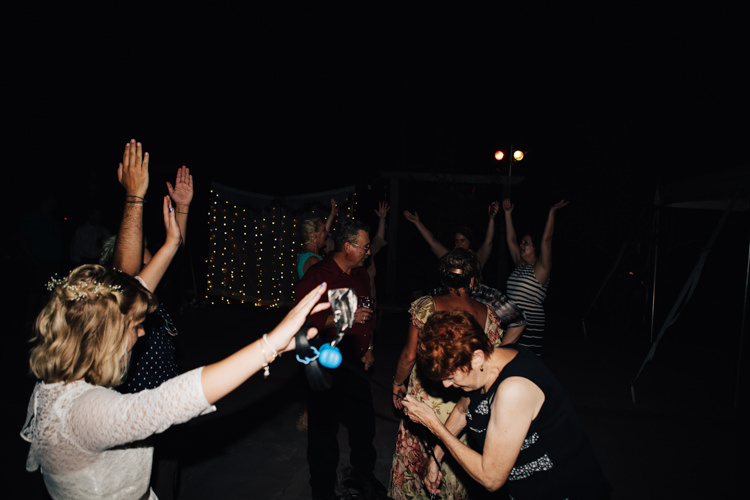 Outdoor Reception Dancing Fairy Lights Bride Handmade Lace Bridal Gown Guests Adventure Inspired Woodland Wedding North Carolina http://www.amandasuttonphotography.com/