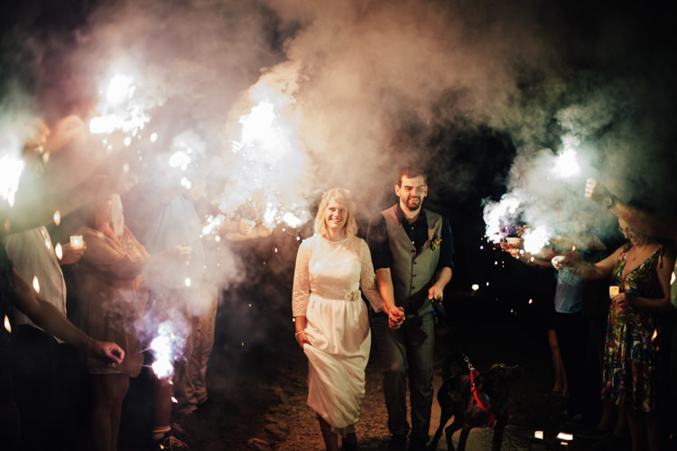 Reception Sparkler Exit Bride Handmade Lace Bridal Gown Groom Grey Vest Pants Navy Blue Shirt Guests Adventure Inspired Woodland Wedding North Carolina http://www.amandasuttonphotography.com/