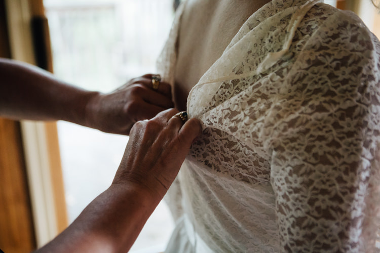 Bride Getting Ready Handmade Lace Floral Belt Bridal Gown Adventure Inspired Woodland Wedding North Carolina http://www.amandasuttonphotography.com/