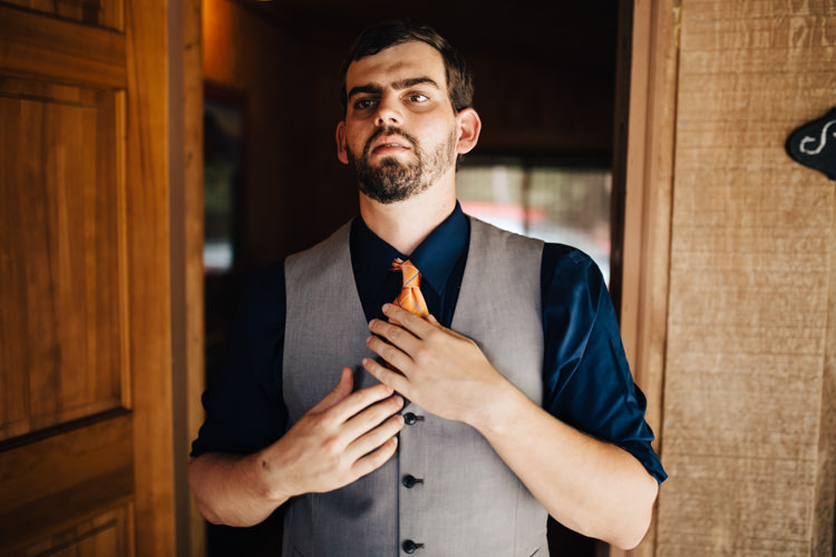 Groom Grey Vest Navy Blue Shirt Orange Tie Adventure Inspired Woodland Wedding North Carolina http://www.amandasuttonphotography.com/