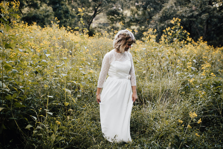 Bride Handmade Lace Floral Belt Bridal Gown Loose Curls Hairstyle Gypsophila Yellow Flowers Adventure Inspired Woodland Wedding North Carolina http://www.amandasuttonphotography.com/
