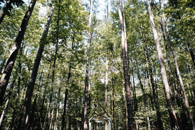 Outdoor Ceremony Location Decorated Wooden Arbour Tall Trees Adventure Inspired Woodland Wedding North Carolina http://www.amandasuttonphotography.com/
