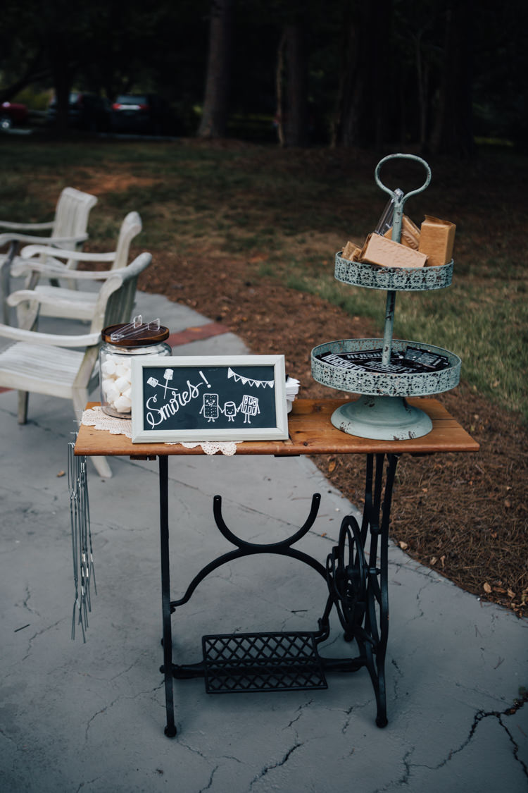 Reception Outdoor S'mores Station Antique Sewing Table Blackboard Sign Adventure Inspired Woodland Wedding North Carolina http://www.amandasuttonphotography.com/