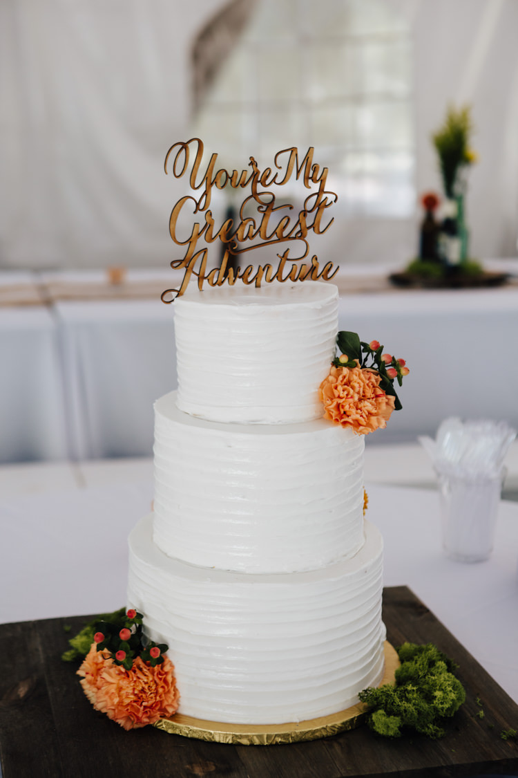 Reception Wedding Cake Three Tiers Orange Carnations Sweet Quote Cake Topper Adventure Inspired Woodland Wedding North Carolina http://www.amandasuttonphotography.com/