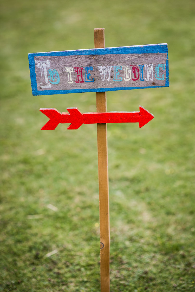 Rustic Wooden Sign Post Circus Colourful Vintage Comic Book Wedding Ideas http://www.hayleypettitphotography.com/