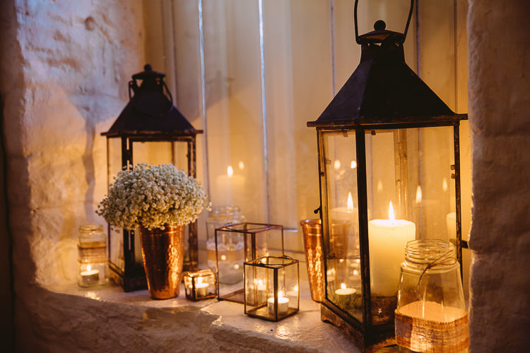 Lanterns Candles Flowers Decor Tea Lights Magical Winter Rustic Wonderland Wedding http://hayleybaxterphotography.com/