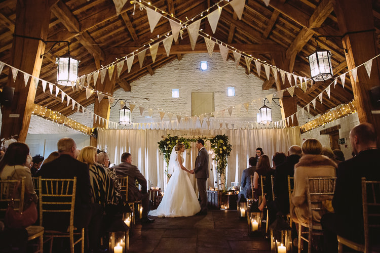 Ceremony Candles Lights Barn Aisle Decor Magical Winter Rustic Wonderland Wedding http://hayleybaxterphotography.com/