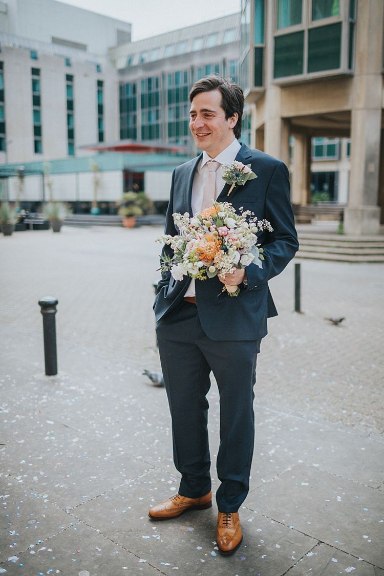 Groom Holding Bouquet Whimsical Seaside Wedding Pale Pink Dress http://devlinphotos.co.uk/