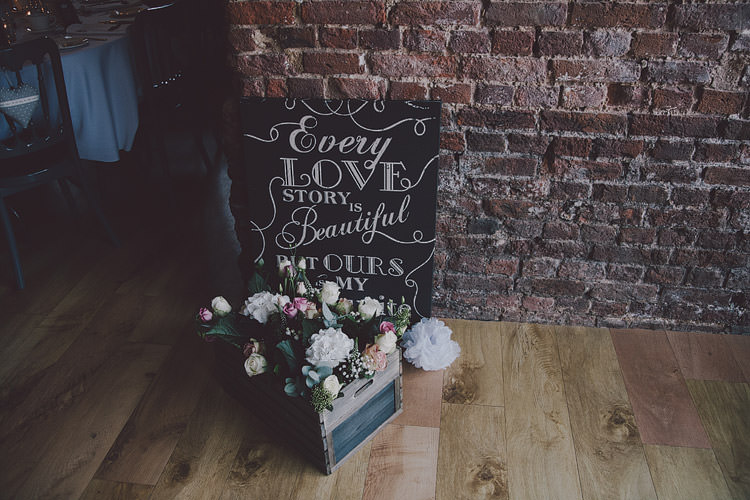 Chalk Black Board Sign Crate Flowers Chic Rustic Grey Barn Wedding http://www.kevelkinsphotography.co.uk/
