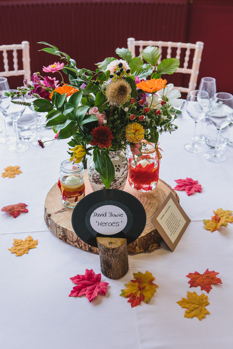 Colourful Floral Centrepiece Record Table Name Relaxed Cosy Stylish Autumnal Wedding http://www.tierneyphotography.co.uk/