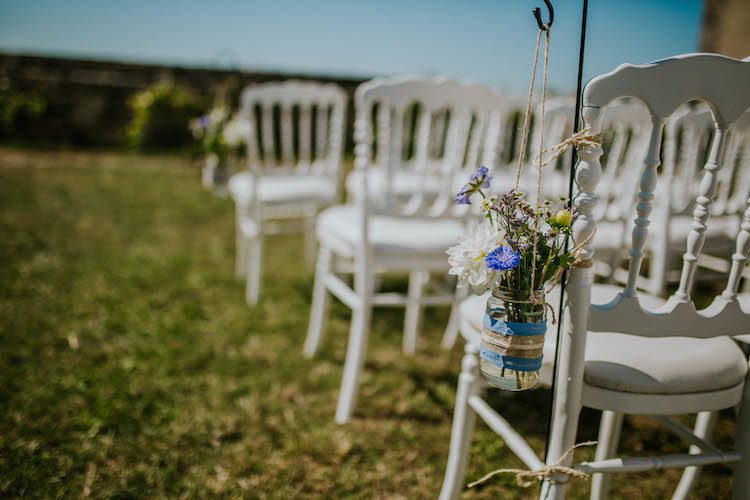 Jar Flowers Chair Ceremony Aisle Pew End Summertime French Village Destination Wedding http://www.pippacarvellphotography.com/