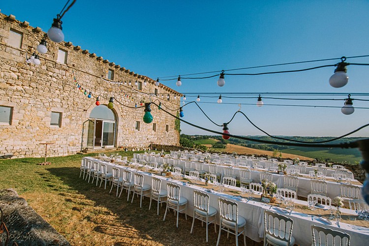 Outdoor Reception Tables Festoon Lights Long Tables Summertime French Village Destination Wedding http://www.pippacarvellphotography.com/