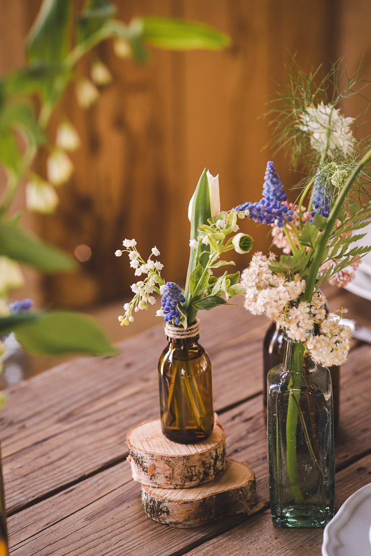 Brown Bottle Flowers Log Magical Spring Bluebell Woodland Wedding Ideas http://helinebekker.co.uk/