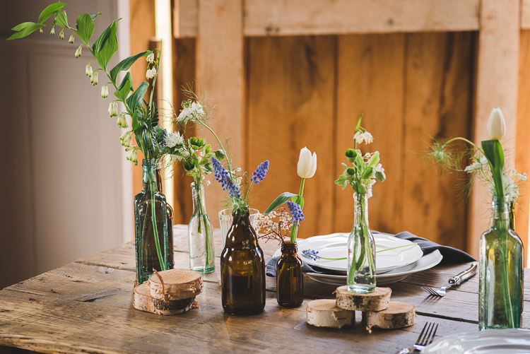 Bottle Flowers Table Decor Magical Spring Bluebell Woodland Wedding Ideas http://helinebekker.co.uk/
