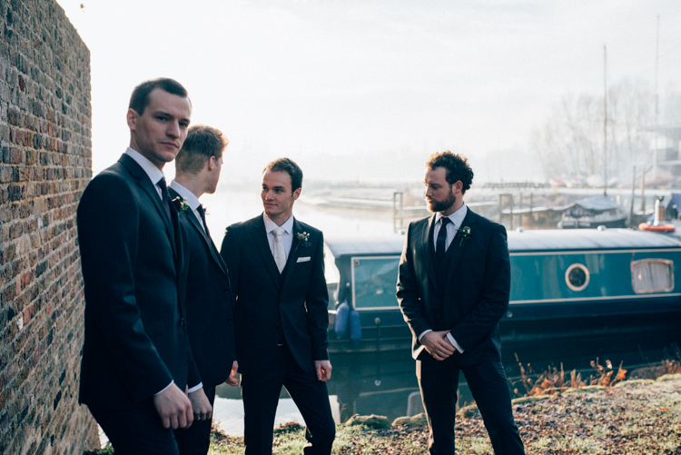 Groom DKNY Suit Moss Bros Heartwarming Festive Winter Wedding http://www.nikkivandermolen.com/