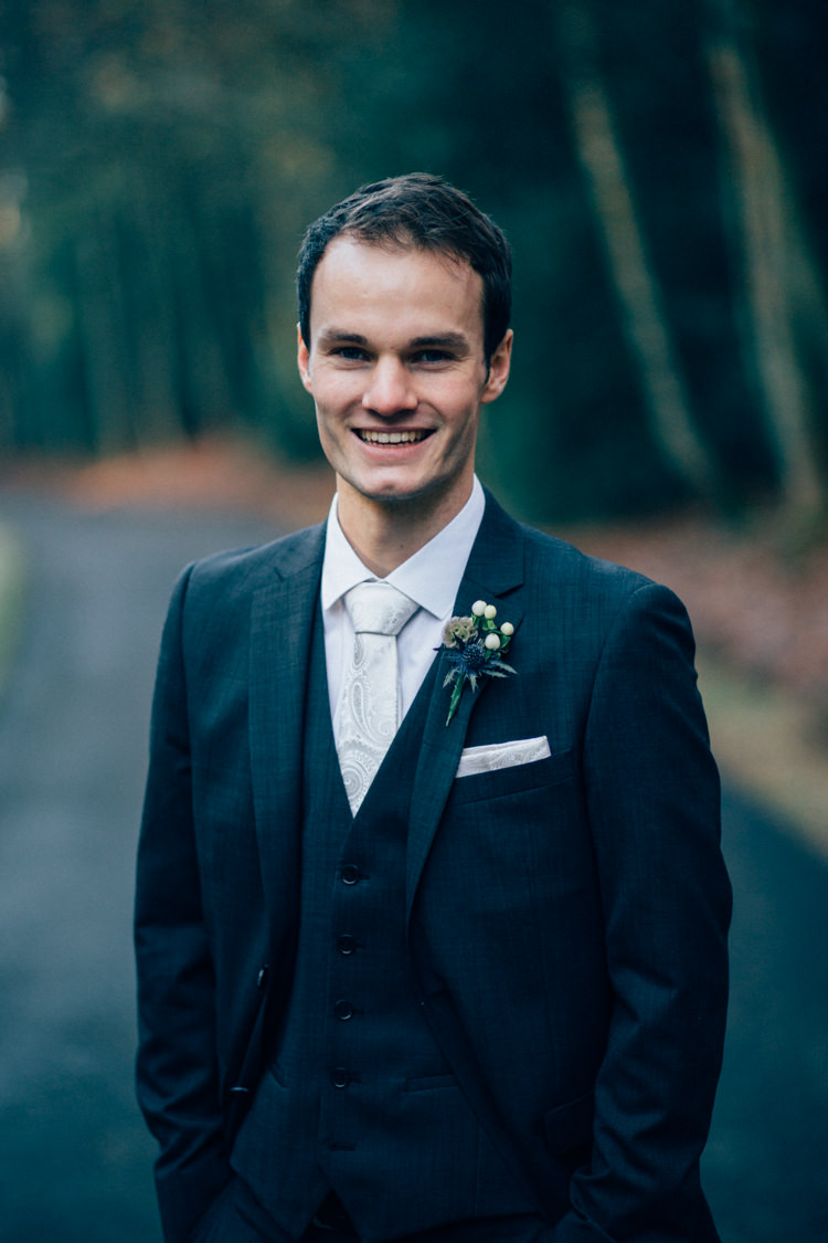 Groom DKNY Moss Bros Heartwarming Festive Winter Wedding http://www.nikkivandermolen.com/ 