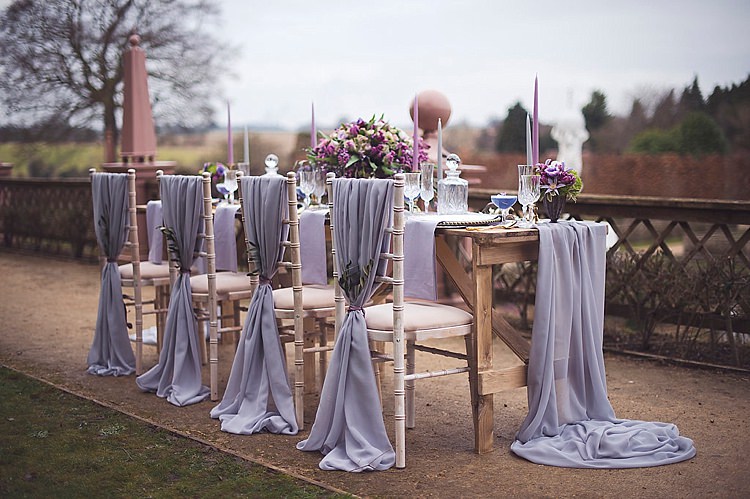 Flowers Arrangement Table Centrepiece Decor Tablescape Purple Lilac Swags Fabric Chairs Violet Spring Luxe Wedding Ideas http://www.katieingram.co.uk/