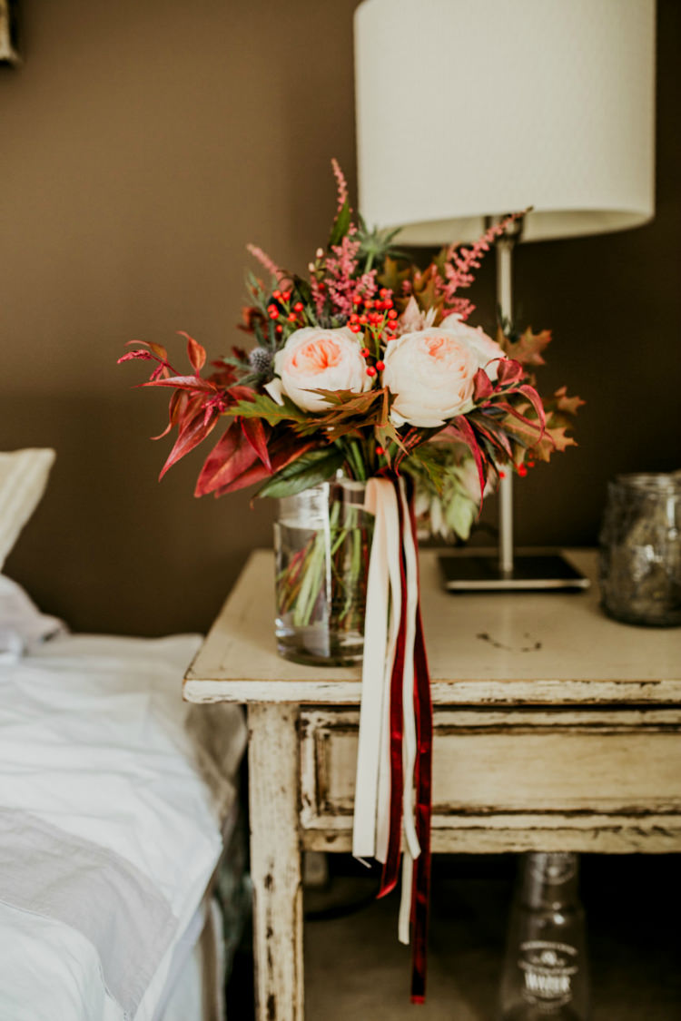 Bride Bouquet Cream Garden Roses Seasonal Leaves Berries Long Cream Maroon Ribbons Glass Vase From Dawn To Eternity Autumnal Wedding Ideas http://www.nataliaibarra.com