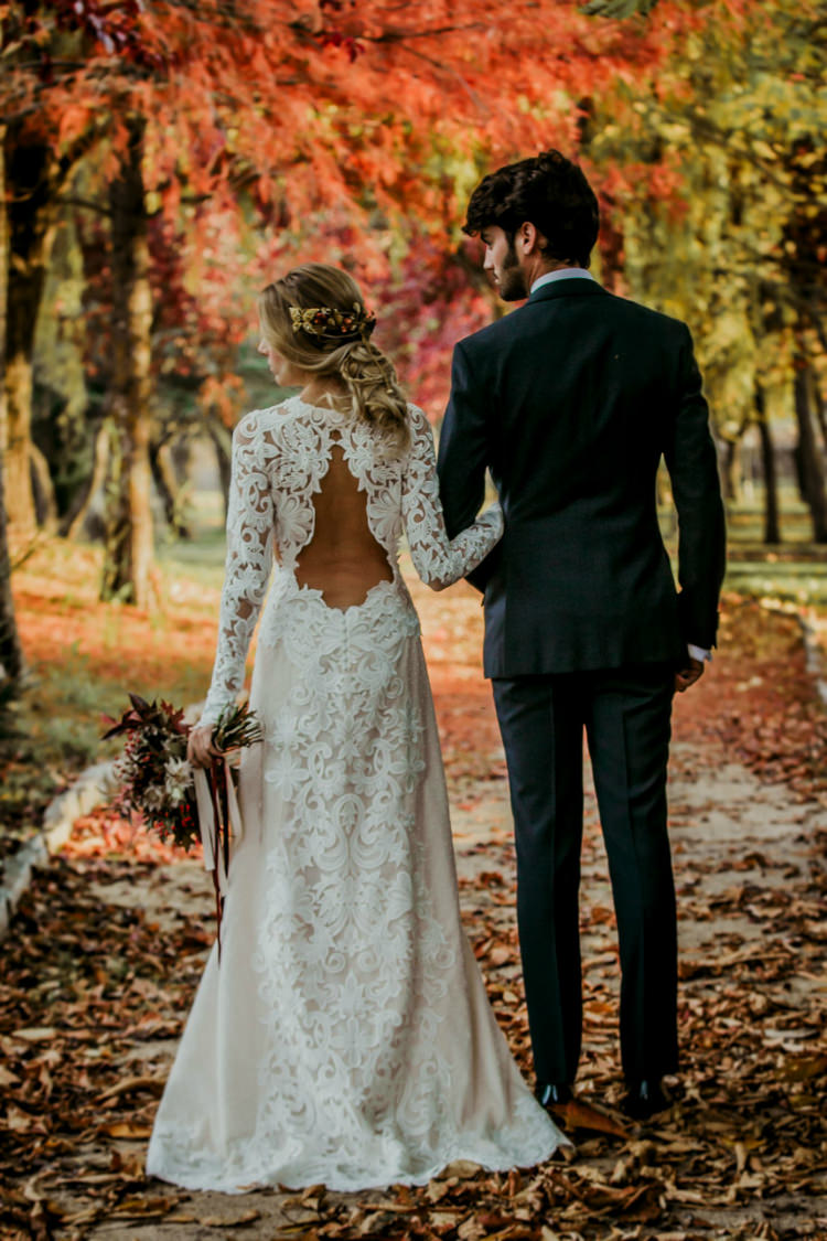 Bride Lace Backless Bridal Gown Intricate Autumn Leaves Headpiece Bouquet Garden Roses Seasonal Leaves Berries Groom Charcoal Suit Purple Patterned Tie Trees From Dawn To Eternity Autumnal Wedding Ideas http://www.nataliaibarra.com