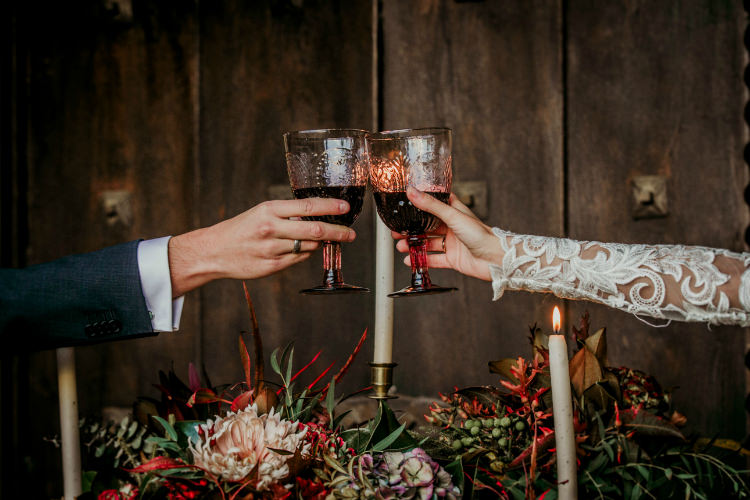 Rustic Reception Bride Lace Bridal Gown Groom Charcoal Suit Fresh Flowers Gold Candlesticks Wine Goblets From Dawn To Eternity Autumnal Wedding Ideas http://www.nataliaibarra.com