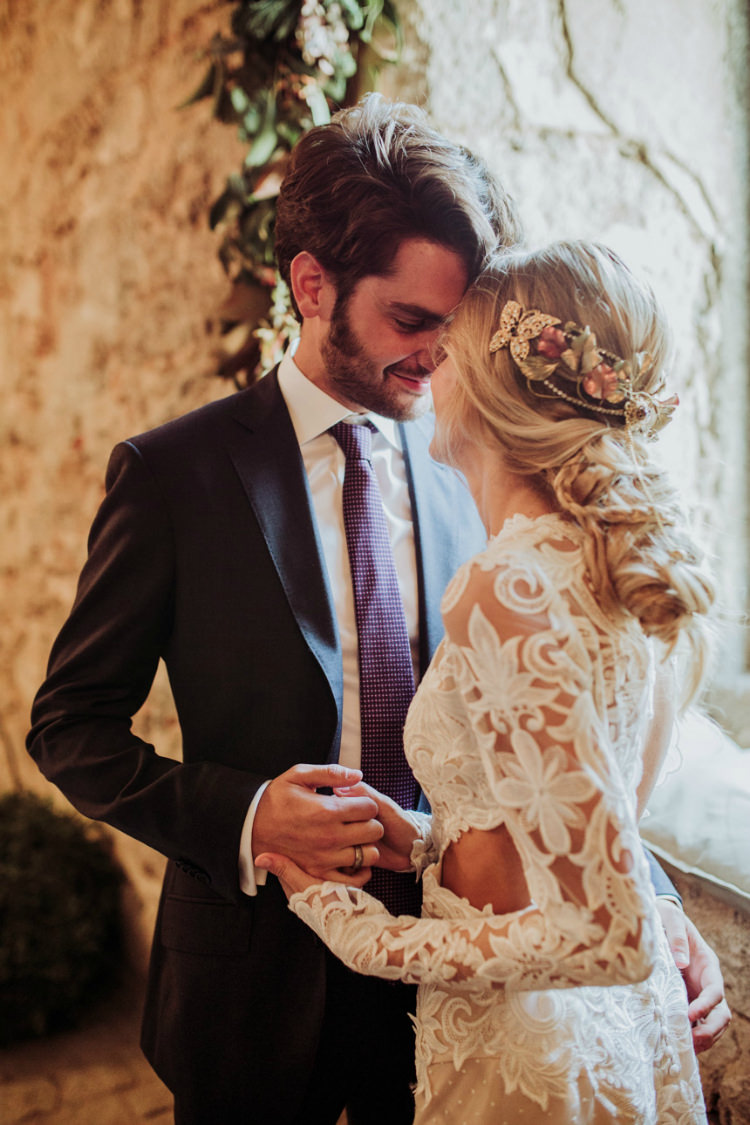 Bride Lace Backless Bridal Gown Intricate Autumn Leaves Headpiece Groom Charcoal Suit Purple Patterned Tie Window Florals Greenery From Dawn To Eternity Autumnal Wedding Ideas http://www.nataliaibarra.com