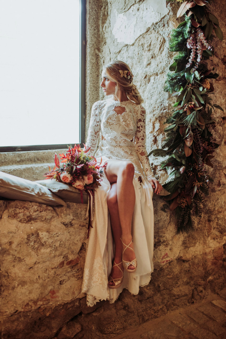 Bride Lace Backless Bridal Gown Intricate Autumn Leaves Headpiece Bouquet Cream Garden Roses Seasonal Leaves Berries Maroon Cream Ribbons Glittery Heels Window Florals Greenery From Dawn To Eternity Autumnal Wedding Ideas http://www.nataliaibarra.com