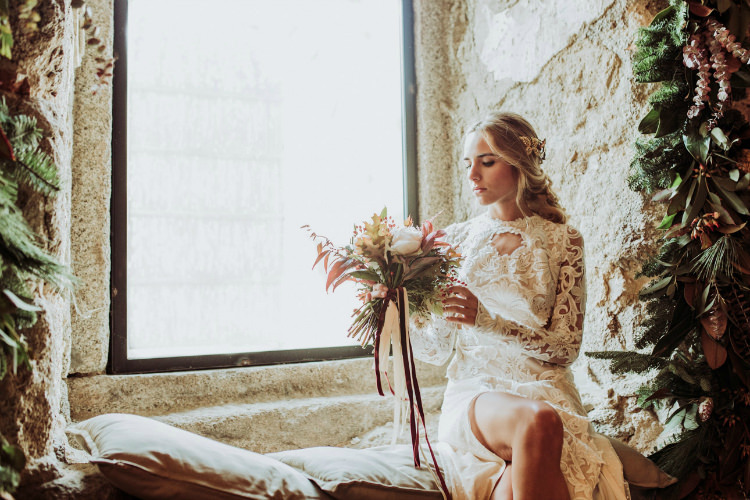 Bride Lace Backless Bridal Gown Intricate Autumn Leaves Headpiece Bouquet Cream Garden Roses Seasonal Leaves Berries Maroon Cream Ribbons Window Florals Greenery From Dawn To Eternity Autumnal Wedding Ideas http://www.nataliaibarra.com