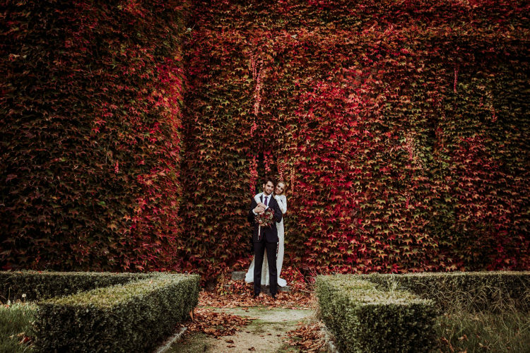 Bride Lace Backless Bridal Gown Bouquet Groom Charcoal Suit Purple Patterned Tie Autumn Leaves From Dawn To Eternity Autumnal Wedding Ideas http://www.nataliaibarra.com