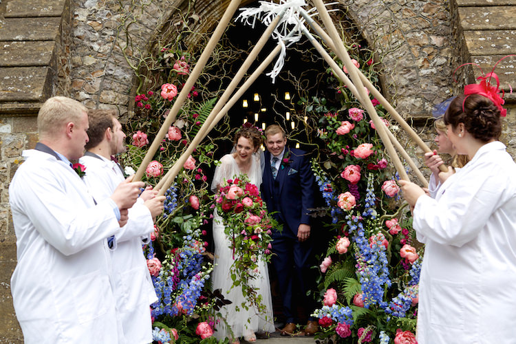 Archway Exit Church Bride Groom Farmer Floral Artistic Farm Wedding http://elizabetharmitage.com/