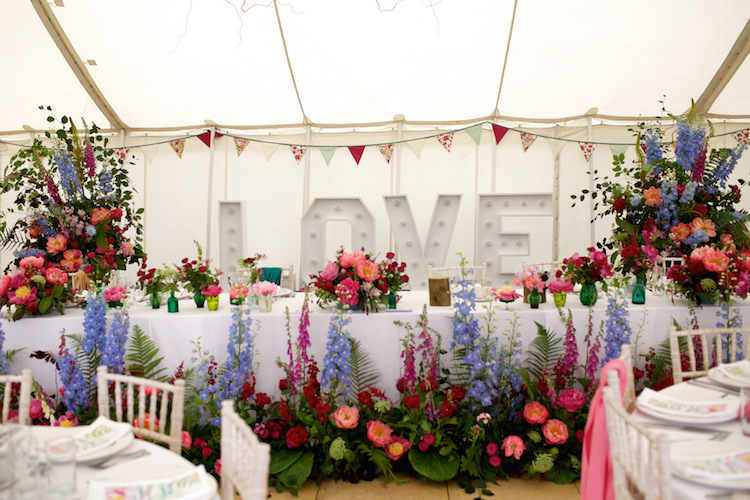Top Table LOVE Letter Lights Summer Marquee Flowers Pink Blue Floral Artistic Farm Wedding http://elizabetharmitage.com/