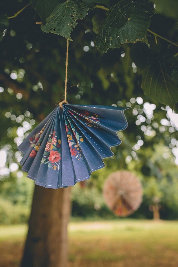 Hanging Paper Fan Decor Homespun Fun Country Barn Wedding http://storyandcolour.co.uk/