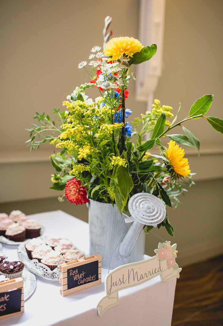 Watering Can Flowers Decor Fun Quirky 1950s Wedding http://www.lisacarpenterphotos.com/